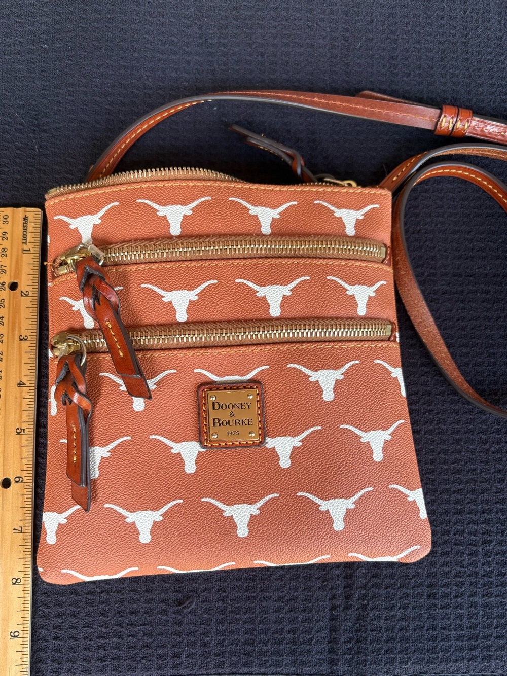 Dooney & Bourke Burnt Orange Crossbody with White Texas Longhorn Motif